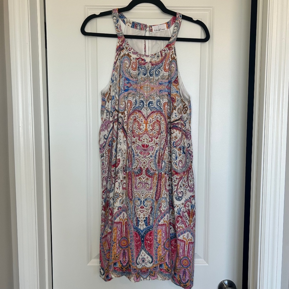 Adorable Halter Dress for many occasions. Paisley print with liner too. EUC